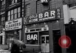 Image of Lenox Avenue, Harlem, New York City, on a snowy day New York City USA, 1963, second 56 stock footage video 65675035550
