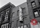Image of Lenox Avenue, Harlem, New York City, on a snowy day New York City USA, 1963, second 59 stock footage video 65675035550