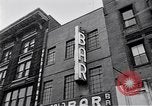 Image of Lenox Avenue, Harlem, New York City, on a snowy day New York City USA, 1963, second 60 stock footage video 65675035550