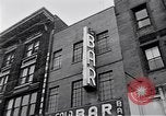 Image of Lenox Avenue, Harlem, New York City, on a snowy day New York City USA, 1963, second 61 stock footage video 65675035550