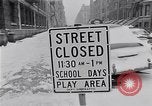 Image of Snow scene in Harlem New York City USA, 1963, second 3 stock footage video 65675035556