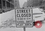 Image of Snow scene in Harlem New York City USA, 1963, second 5 stock footage video 65675035556