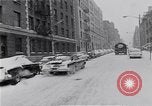 Image of Snow scene in Harlem New York City USA, 1963, second 11 stock footage video 65675035556