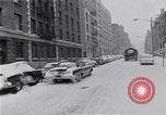 Image of Snow scene in Harlem New York City USA, 1963, second 13 stock footage video 65675035556