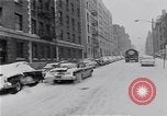 Image of Snow scene in Harlem New York City USA, 1963, second 14 stock footage video 65675035556