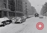 Image of Snow scene in Harlem New York City USA, 1963, second 15 stock footage video 65675035556