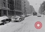 Image of Snow scene in Harlem New York City USA, 1963, second 16 stock footage video 65675035556
