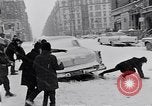 Image of Snow scene in Harlem New York City USA, 1963, second 35 stock footage video 65675035556