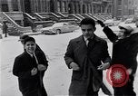 Image of Snow scene in Harlem New York City USA, 1963, second 51 stock footage video 65675035556