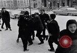 Image of Snow scene in Harlem New York City USA, 1963, second 54 stock footage video 65675035556