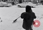 Image of Snow scene in Harlem New York City USA, 1963, second 57 stock footage video 65675035556