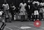 Standbild 1930er Jahre afroamerikanische Kinder Harlem New York City USA, 1939, aus Sekunde 9 historischem Filmmaterial Videoclip 65675035581