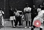 Standbild 1930er Jahre afroamerikanische Kinder Harlem New York City USA, 1939, aus Sekunde 13 historischem Filmmaterial Videoclip 65675035581