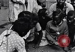 Standbild 1930er Jahre afroamerikanische Kinder Harlem New York City USA, 1939, aus Sekunde 23 historischem Filmmaterial Videoclip 65675035581