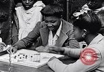 Standbild 1930er Jahre afroamerikanische Kinder Harlem New York City USA, 1939, aus Sekunde 39 historischem Filmmaterial Videoclip 65675035581