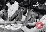Standbild 1930er Jahre afroamerikanische Kinder Harlem New York City USA, 1939, aus Sekunde 45 historischem Filmmaterial Videoclip 65675035581