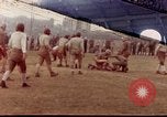Image of Football field in racecourse infield Tsingtao China, 1946, second 1 stock footage video 65675035638