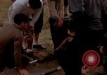 Image of Football field in racecourse infield Tsingtao China, 1946, second 8 stock footage video 65675035638