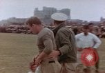 Image of Football field in racecourse infield Tsingtao China, 1946, second 11 stock footage video 65675035638
