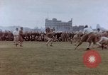 Image of Football field in racecourse infield Tsingtao China, 1946, second 15 stock footage video 65675035638