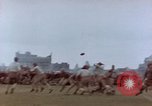 Image of Football field in racecourse infield Tsingtao China, 1946, second 17 stock footage video 65675035638