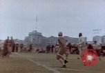 Image of Football field in racecourse infield Tsingtao China, 1946, second 18 stock footage video 65675035638
