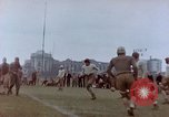 Image of Football field in racecourse infield Tsingtao China, 1946, second 20 stock footage video 65675035638