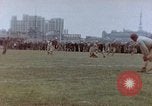 Image of Football field in racecourse infield Tsingtao China, 1946, second 21 stock footage video 65675035638