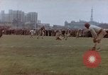 Image of Football field in racecourse infield Tsingtao China, 1946, second 22 stock footage video 65675035638