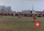 Image of Football field in racecourse infield Tsingtao China, 1946, second 23 stock footage video 65675035638