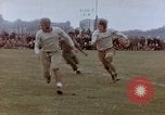 Image of Football field in racecourse infield Tsingtao China, 1946, second 31 stock footage video 65675035638