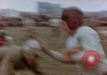 Image of Football field in racecourse infield Tsingtao China, 1946, second 33 stock footage video 65675035638