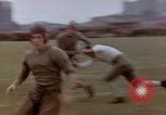 Image of Football field in racecourse infield Tsingtao China, 1946, second 34 stock footage video 65675035638