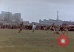 Image of Football field in racecourse infield Tsingtao China, 1946, second 36 stock footage video 65675035638
