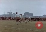 Image of Football field in racecourse infield Tsingtao China, 1946, second 41 stock footage video 65675035638