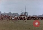 Image of Football field in racecourse infield Tsingtao China, 1946, second 45 stock footage video 65675035638