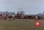 Image of Football field in racecourse infield Tsingtao China, 1946, second 46 stock footage video 65675035638