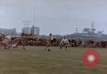 Image of Football field in racecourse infield Tsingtao China, 1946, second 47 stock footage video 65675035638