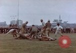 Image of Football field in racecourse infield Tsingtao China, 1946, second 55 stock footage video 65675035638