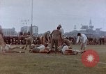 Image of Football field in racecourse infield Tsingtao China, 1946, second 56 stock footage video 65675035638