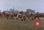 Image of Football field in racecourse infield Tsingtao China, 1946, second 58 stock footage video 65675035638