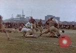 Image of Football field in racecourse infield Tsingtao China, 1946, second 61 stock footage video 65675035638