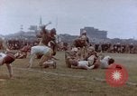 Image of Football field in racecourse infield Tsingtao China, 1946, second 62 stock footage video 65675035638