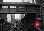 Image of Elevated train of the Interborough Rapid Transit System in Manhattan New York City USA, 1916, second 8 stock footage video 65675035665