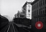Image of Elevated train of the Interborough Rapid Transit System in Manhattan New York City USA, 1916, second 25 stock footage video 65675035665