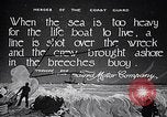 Image of breeches buoy rescue Muskegon Michigan USA, 1916, second 1 stock footage video 65675035670
