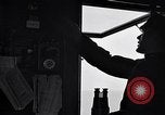 Image of breeches buoy rescue Muskegon Michigan USA, 1916, second 15 stock footage video 65675035670