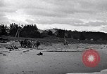 Image of breeches buoy rescue Muskegon Michigan USA, 1916, second 42 stock footage video 65675035670