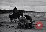 Image of breeches buoy rescue Muskegon Michigan USA, 1916, second 62 stock footage video 65675035670