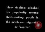 Image of marijuana cigarette New York City USA, 1939, second 1 stock footage video 65675035678